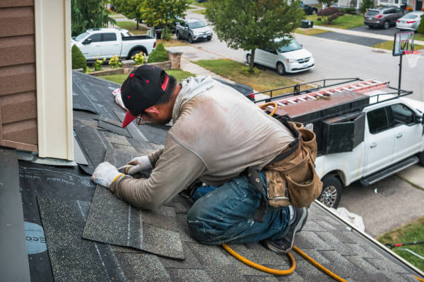 Professional Gutter Repair And Installation technician working in Sixes, OR